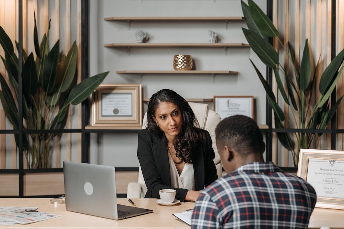 a wrongful death lawyer during consultation meeting with a client a wrongful death lawyer during consultation meeting with a client